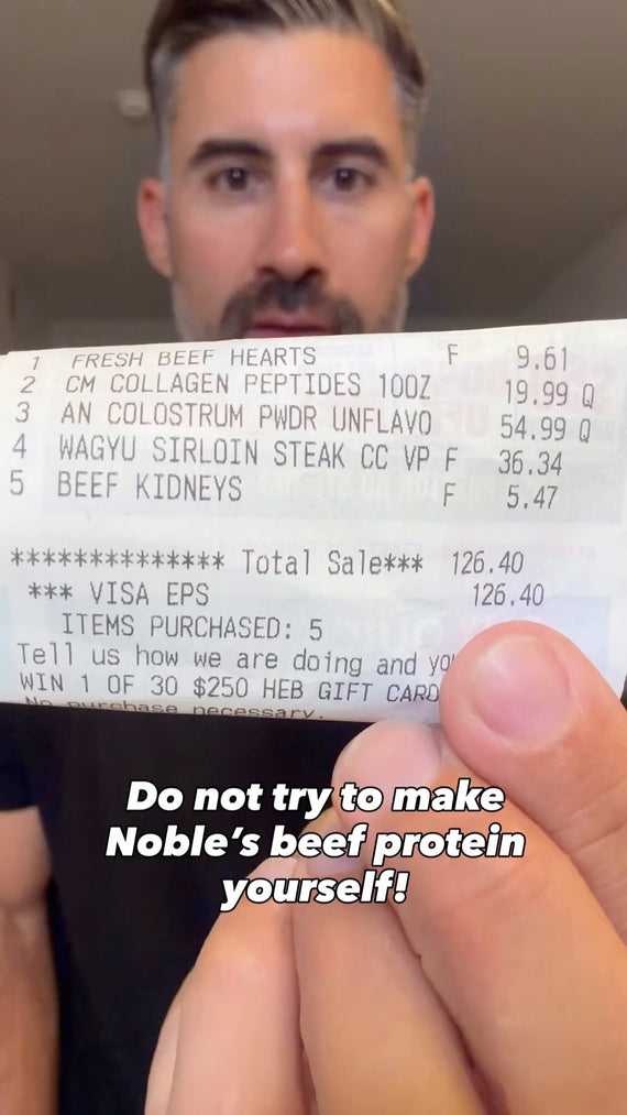 A close-up of a person holding a receipt in front of their face, with a text overlay that reads 'Do not try to make Noble's beef protein yourself!'. The receipt shows beef-related items such as beef hearts, beef kidneys, and Wagyu sirloin steak.